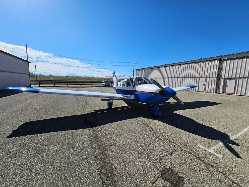 A photo of a small Piper plane